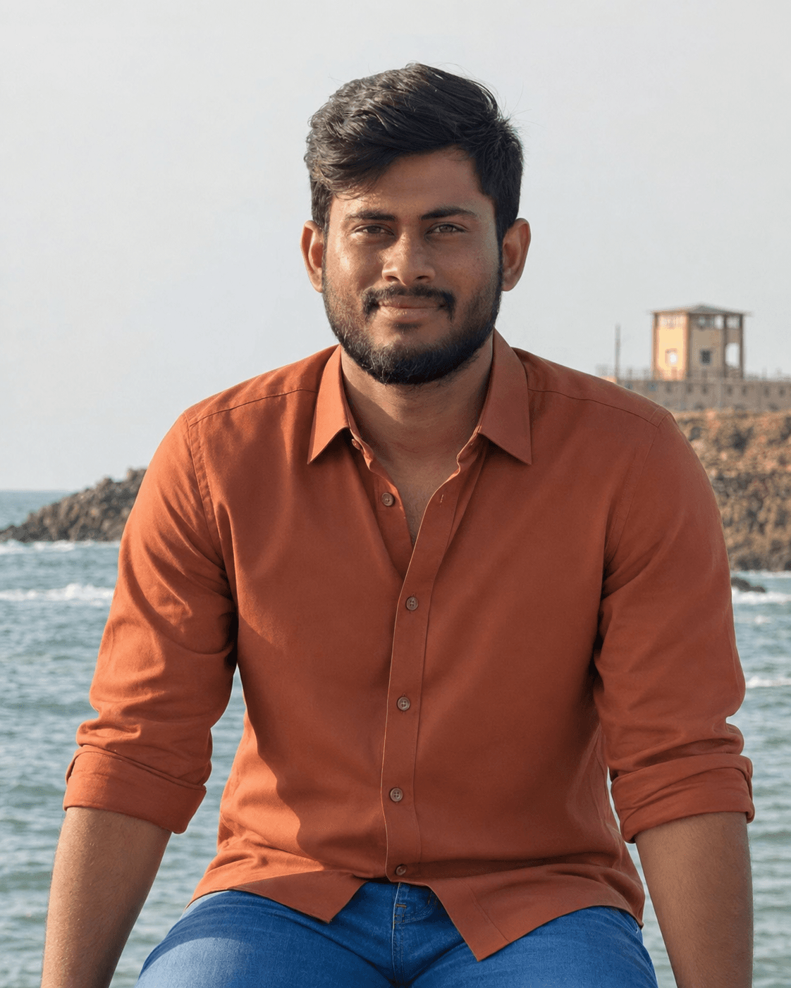 Somu seated by the sea